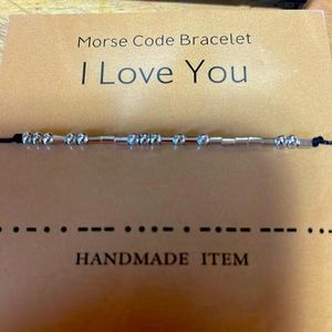 Morse code bracelet that says I love you